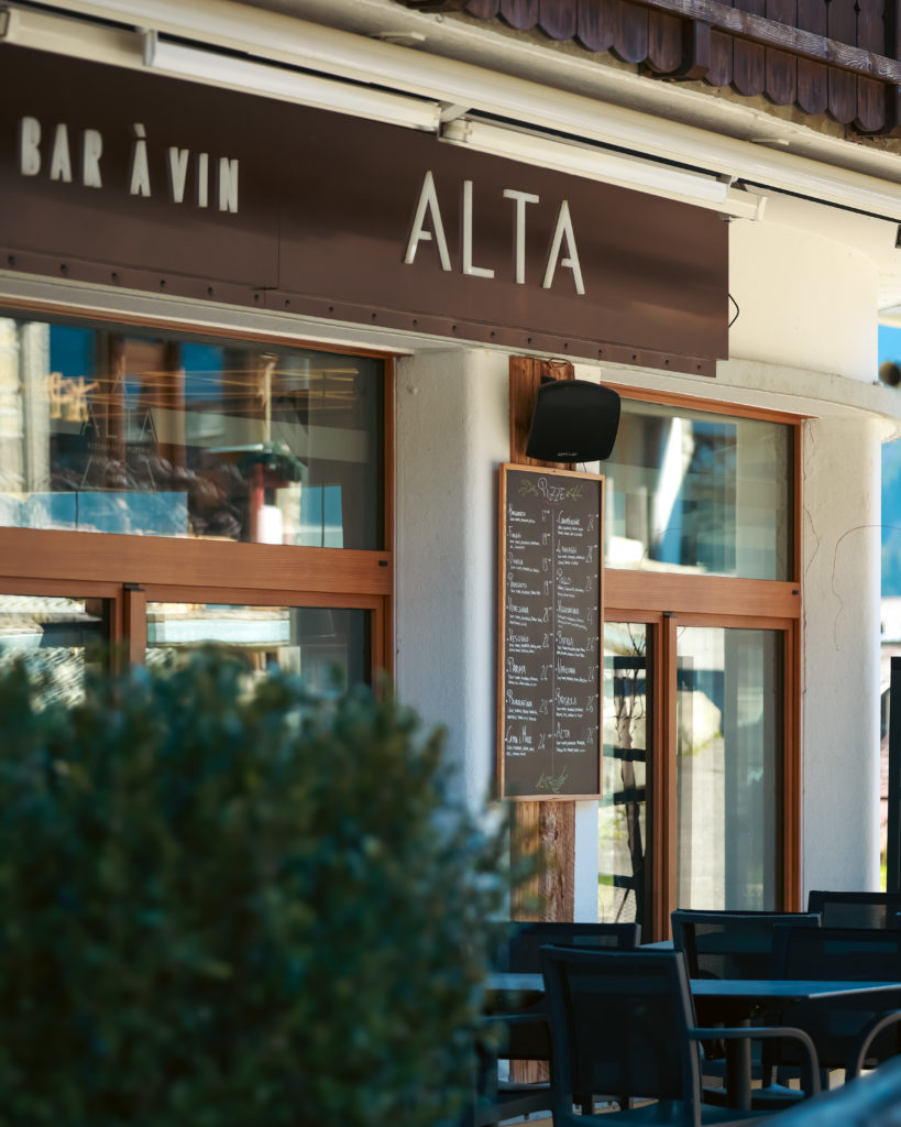 The terrace on the village side of the ALTA 1874 restaurant in Champéry