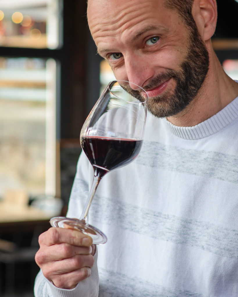 Chef Hadrien tasting wine, Restaurant ALTA 1874 in Champéry